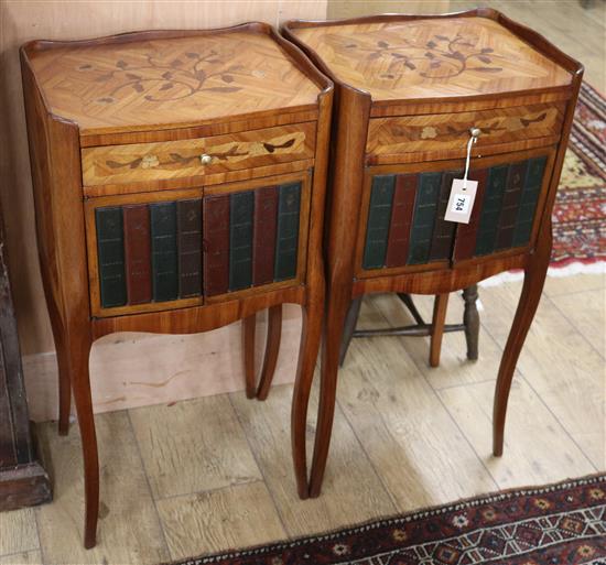 A pair of bedside cabinets with faux books front W.37cm